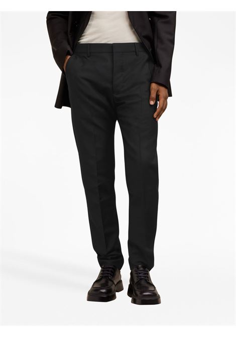 Black pleat-detail tapered chino trousers - men AMI PARIS | HTR004WV0028001