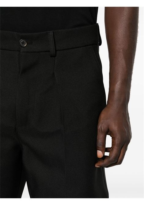 Black Zayden barrel-leg trousers - women NANUSHKA | NM23FWPA01399BLK