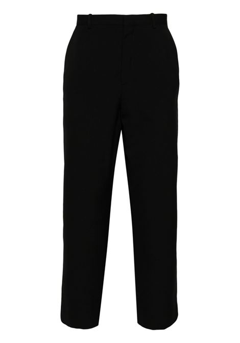 Pantaloni affusolati in nero Acne Studios - uomo ACNE STUDIOS | Pantaloni | BK0640900