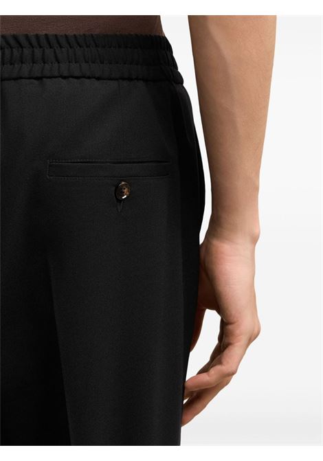 Pantaloni con vita elasticizzata in nero di AMI Paris - uomo AMI PARIS | HTR226WV0044001