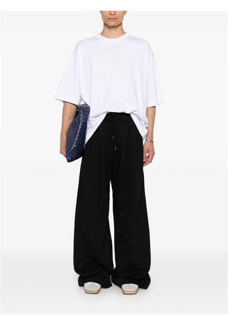 Black pleated track trousers DRIES VAN NOTEN - men DRIES VAN NOTEN | 2420211709614900