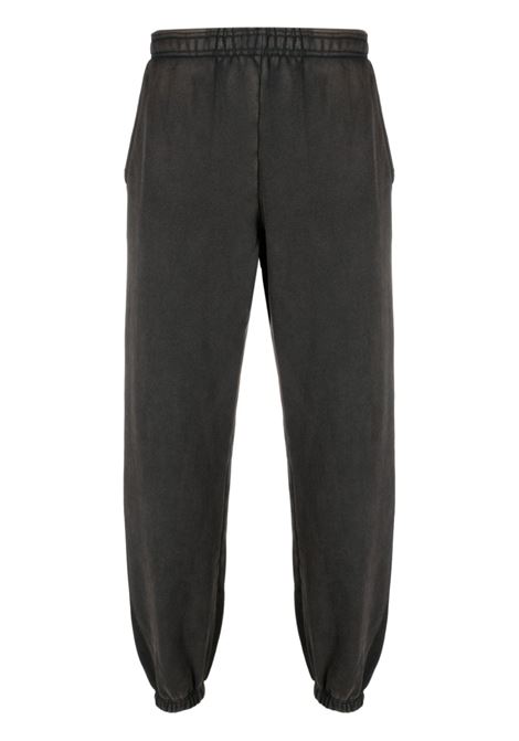 Black tapered track trousers - unisex