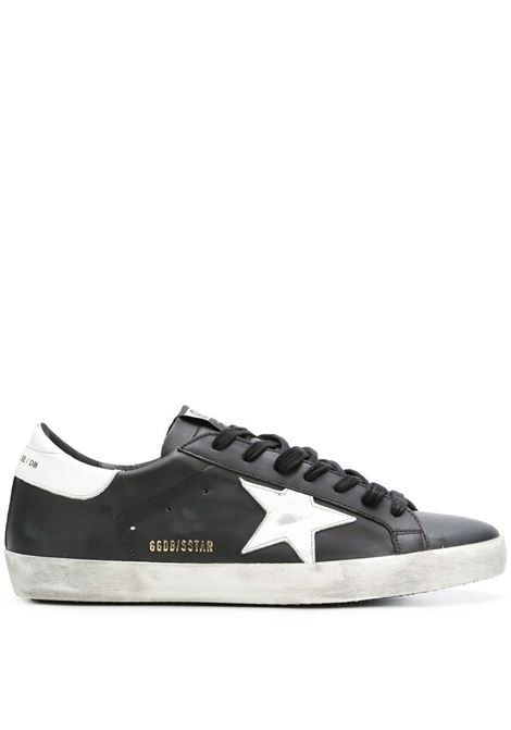 Sneakers Super-Star con effetto vissuto in bianco e nero Golden Goose - uomo