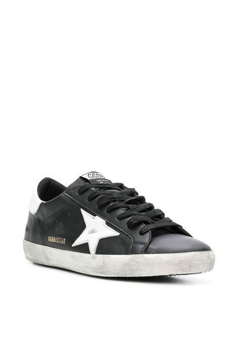 Sneakers Super-Star con effetto vissuto in bianco e nero Golden Goose - uomo GOLDEN GOOSE | GMF00101F00032180203