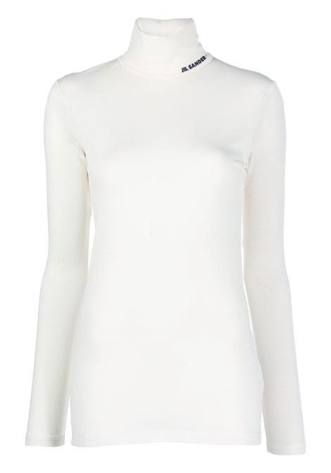 Top a maniche lunghe con collo alto in bianco - donna