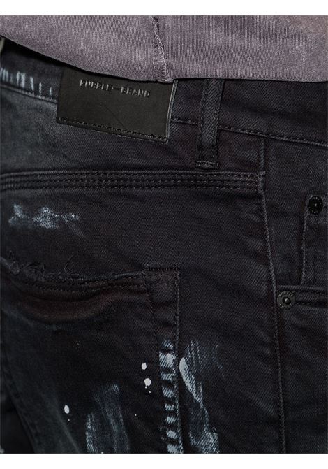 Jeans skinny con effetto vernice in nero di Purple Brand - uomo PURPLE | P001BRKS122BRKS122