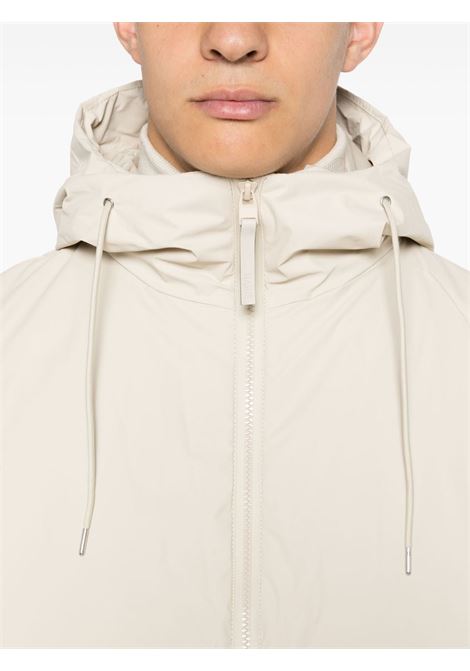 Giacca Lohja corta impermeabile in beige Rains - unisex RAINS | RA15780DUN