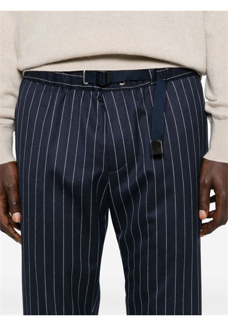 Blue pinstripe-pattern trousers Whitesand - men WHITESAND | 24WSU66571137