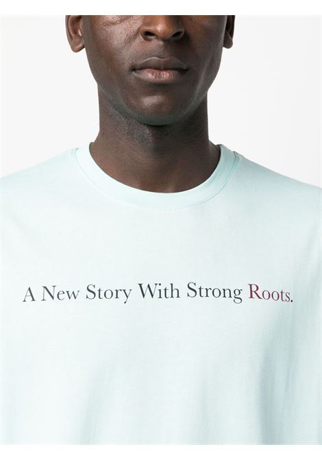 T-shirt con stampa grafica in celeste - unisex THROWBACK | DVTROOTSCIELO
