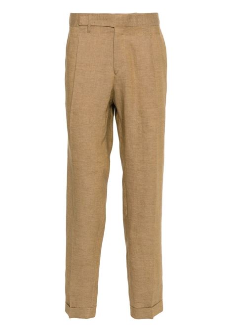 Pantaloni con pieghe in marrone - uomo