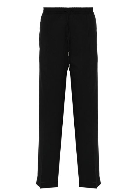 Black pleat-detail tapered trousers - men