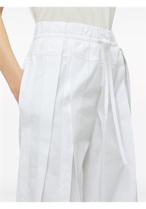 Pantaloni a gamba ampia in bianco - unisex JIL SANDER | J02KA0221J45202100