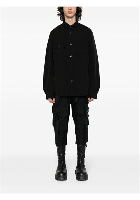 Black panelled-design long-sleeve shirt - men JUNYA WATANABE | WMB0091