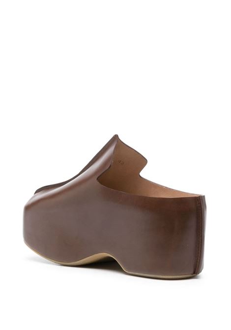 Mules con plateau in marrone - uomo JW ANDERSON | ANM42500A501