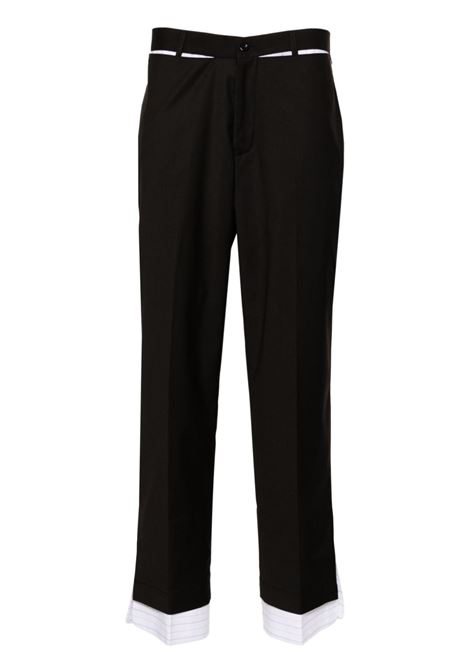 Pantaloni sartoriali con dettagli a contrasto in nero Kidsuper - uomo