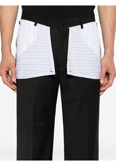Pantaloni sartoriali con dettagli a contrasto in nero Kidsuper - uomo KIDSUPER | SUB12BLK