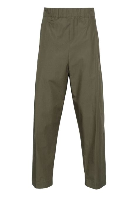 Green tapered trousers - men
