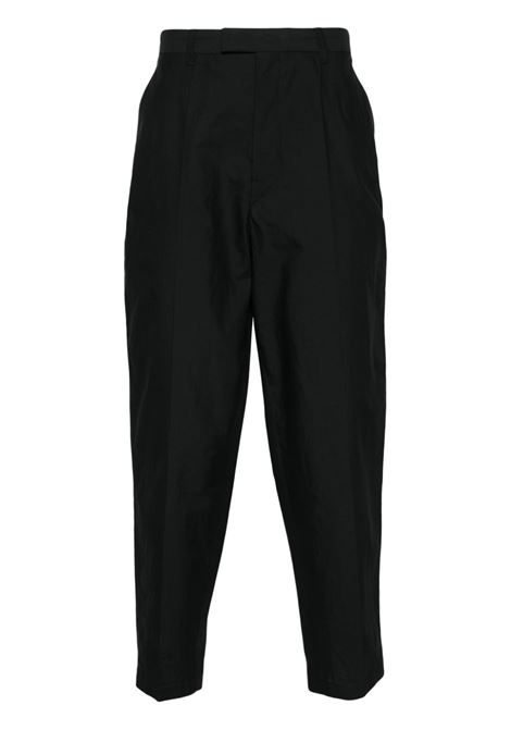 Black pressed-crease trousers - men