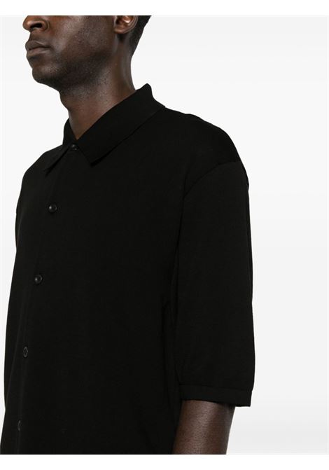 Polo in maglia fine in nero - uomo LEMAIRE | TO1225LK116BK999