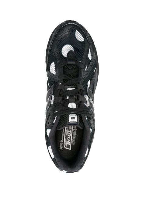 Sneakers basse 1906R in nero e bianco New Balance - unisex NEW BALANCE | M1906RPBPHNTM