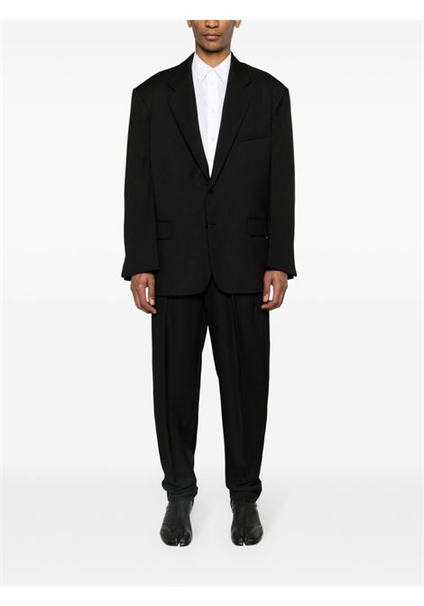 Black pleated tailored trousers - men RANDOM IDENTITIES | RAN03P1051