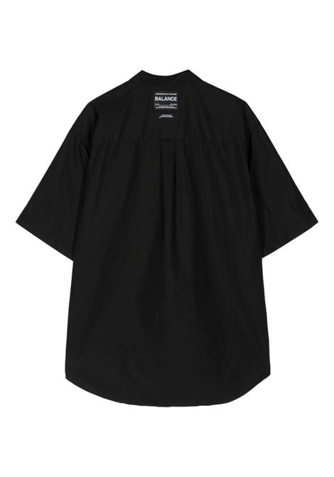 Black logo-tag shirt - men UNDERCOVER | UC1D4407BLK