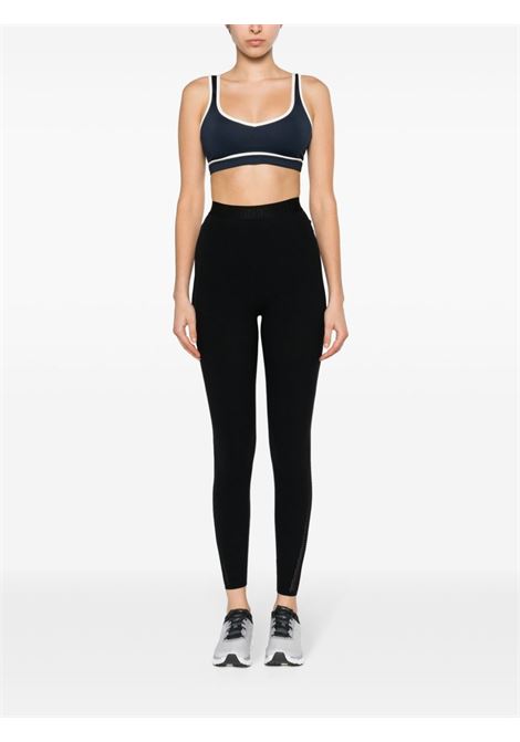 Black logo-waistband perforated leggings - men WOLFORD | 194407005