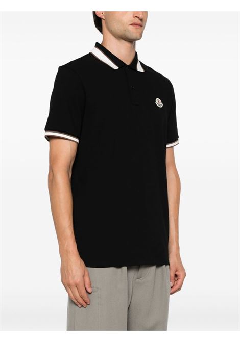 Polo con logo in nero Moncler - uomo MONCLER | 8A0001889A16999