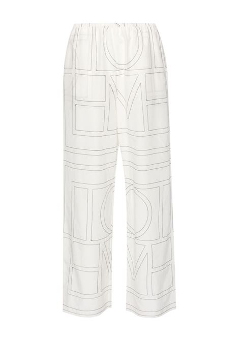 White monogram silk straight-leg trousers Toteme - women