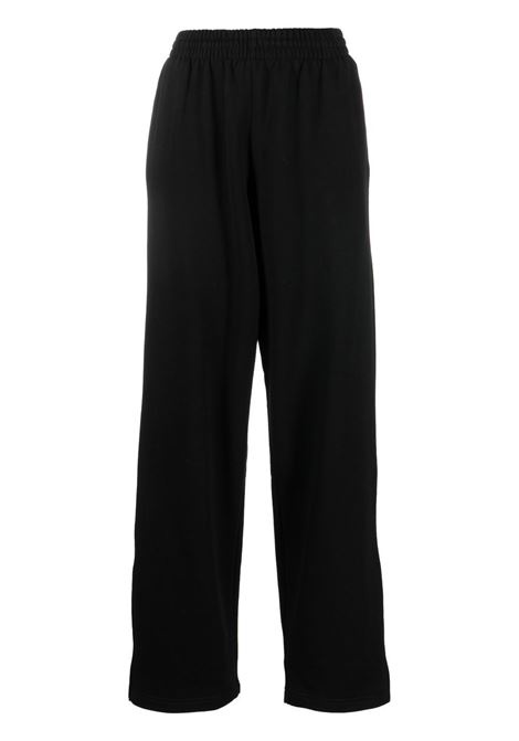 Black x Hailey Bieber track trousers - WARDROBE women WARDROBE.NYC | Trousers | W2049R09BLK