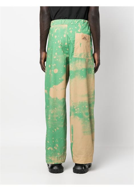 Green and beige spray-paint effect track trousers - men OAMC | 23E28OAU31COTOA043324