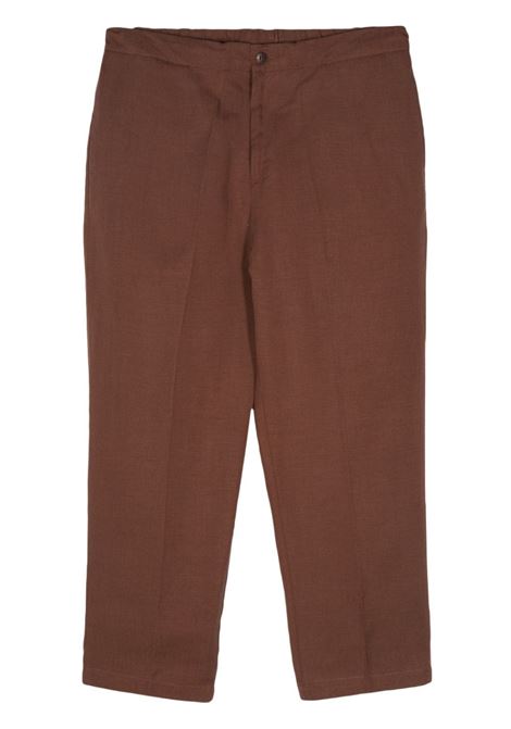 Brown pressed-crease tapered trousers - men COSTUMEIN | W3911502