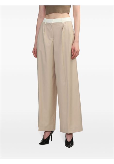 Beige wide-leg tailored trousers - women REMAIN | 5013242764151116