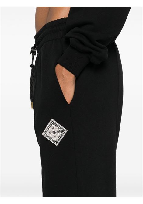 Pantaloni sportivi con decorazione in nero - Casablanca CASABLANCA | WPS25JTR10104BLK