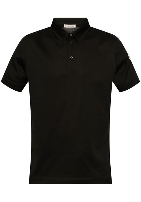 Polo con ricamo logo in nero Moncler - uomo